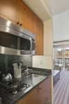 Each kitchenette is equipped with a stove-top, microwave, dishwasher and refrigerator for your convenience